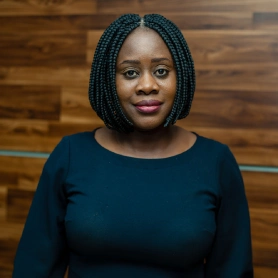 A professional image of the chief operating officer - Olutomi Rone